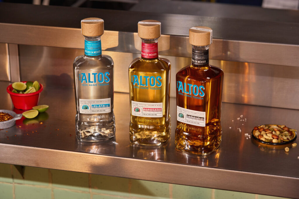 Olmeca Altos Plata, Reposado and Añejo bottles in the foreground