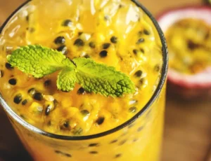 passion fruit margarita with fresh pulp and mint garnish